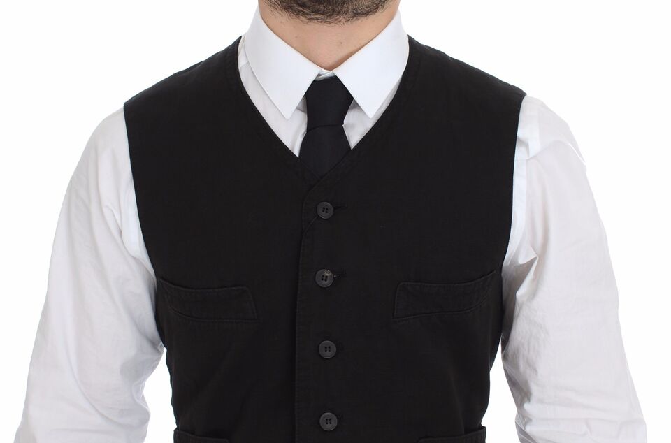 Black flax cotton dress vest blazer by Dolce & Gabbana, tailored fit with lapel collar and button closure, displayed on a hanger.