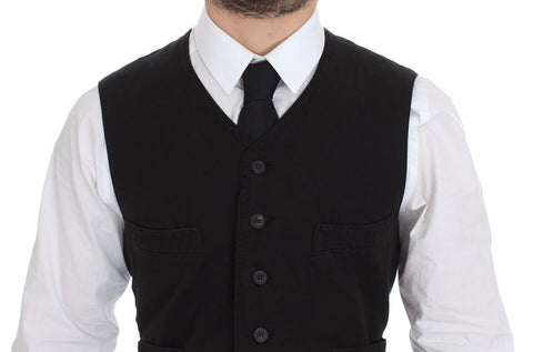 Black flax cotton dress vest blazer by Dolce & Gabbana, tailored fit with lapel collar and button closure, displayed on a hanger.