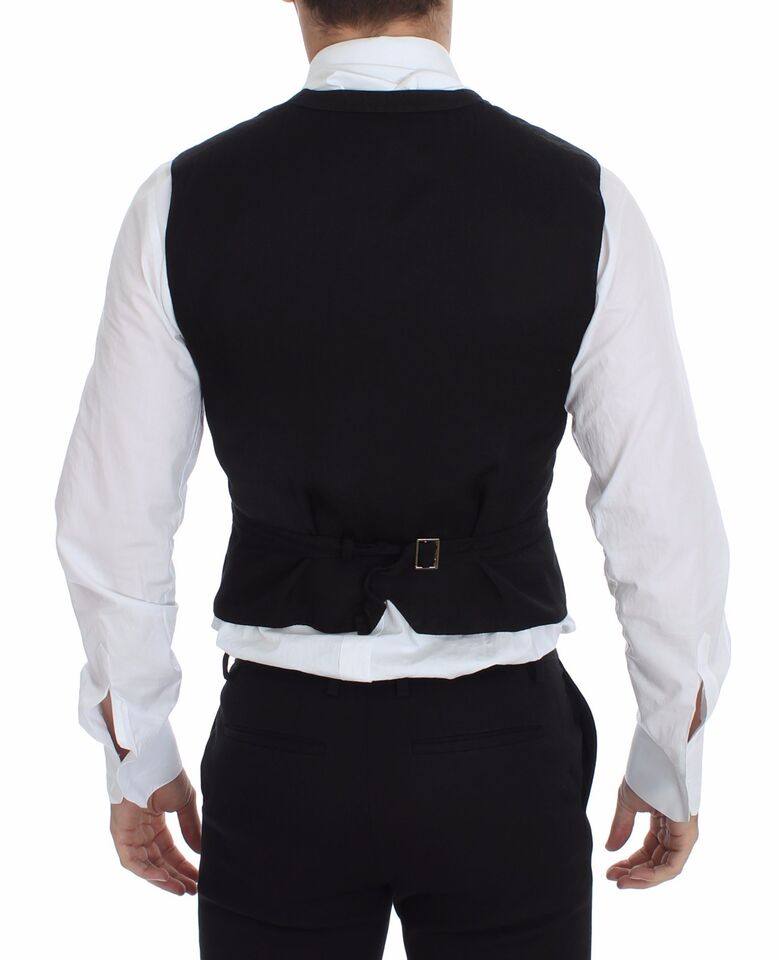 Black flax cotton dress vest blazer by Dolce & Gabbana, tailored fit with lapel collar and button closure, styled for formal wear.