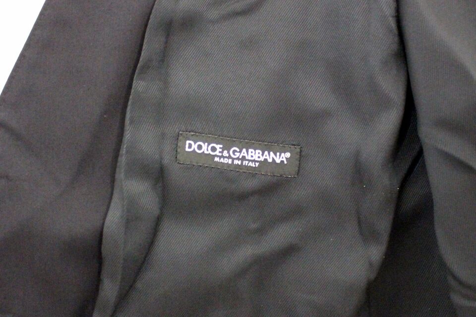 Blue cotton stretch dress vest blazer by Dolce & Gabbana, tailored fit with lapels and button closure, styled for formal wear.