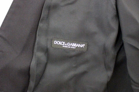 Blue cotton stretch dress vest blazer by Dolce & Gabbana, tailored fit with lapels and button closure, styled for formal wear.