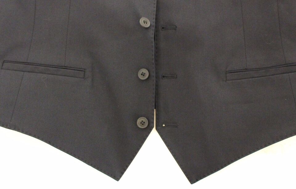 Blue cotton stretch dress vest blazer by Dolce & Gabbana, tailored fit with lapel collar and button closure, styled for formal wear.
