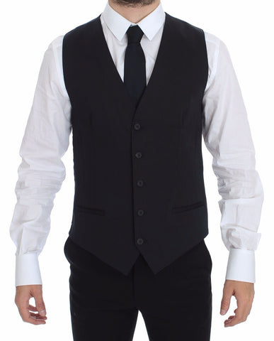 Blue cotton stretch dress vest blazer by Dolce & Gabbana, tailored fit with lapels and button closure, displayed on a hanger.