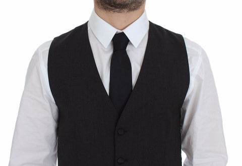 Gray wool stretch dress vest blazer by Dolce & Gabbana, tailored fit with lapel collar and button closure.