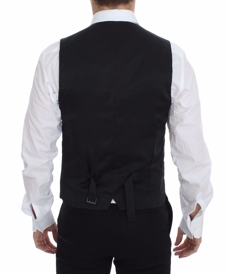 Gray wool stretch dress vest blazer by Dolce & Gabbana, tailored fit with lapels, worn over a shirt.