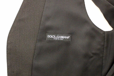 Gray wool stretch dress vest blazer by Dolce & Gabbana, tailored fit with sleek lapels and button closure.