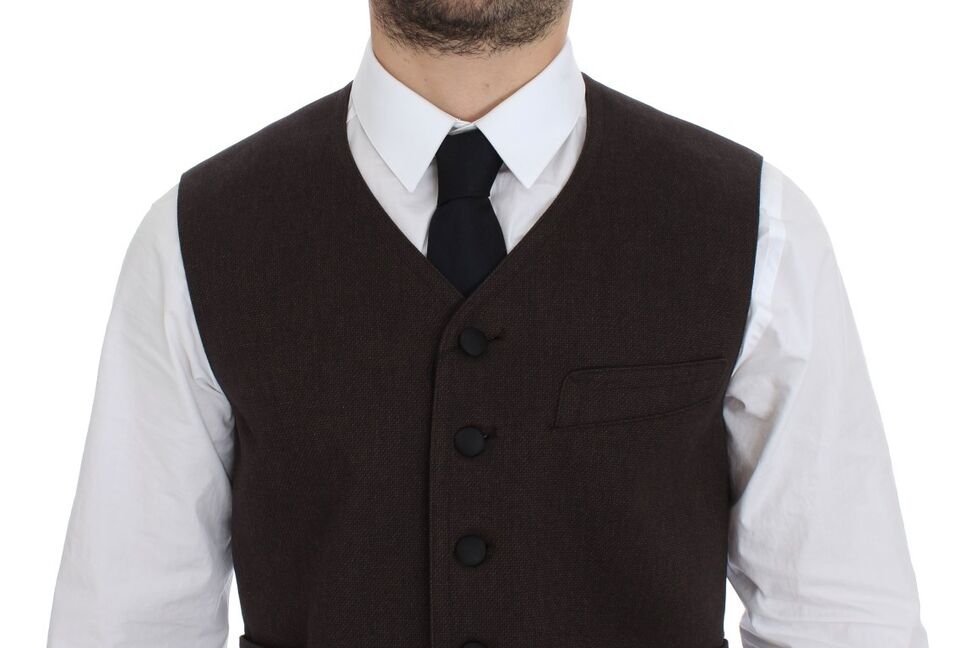 Brown cotton blend dress vest gilet by Dolce & Gabbana, shown on a hanger with a tailored fit and detailed stitching.