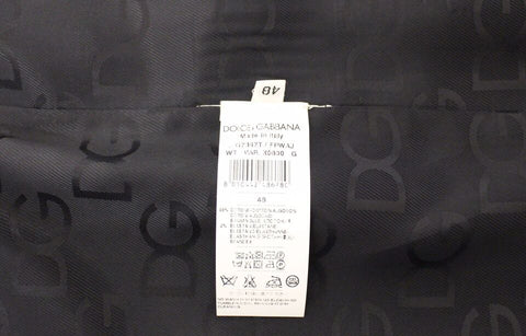 Blue cotton stretch dress vest blazer by Dolce & Gabbana, tailored fit with lapel collar and sleek design.