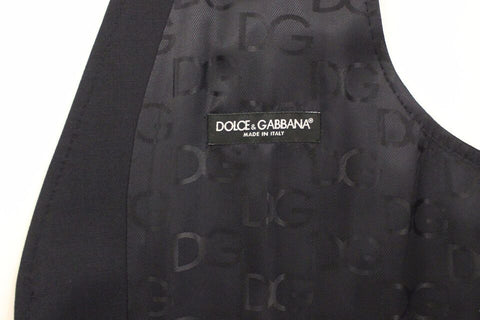 Blue cotton stretch dress vest blazer by Dolce & Gabbana with tailored fit and classic lapel design, displayed on a hanger.