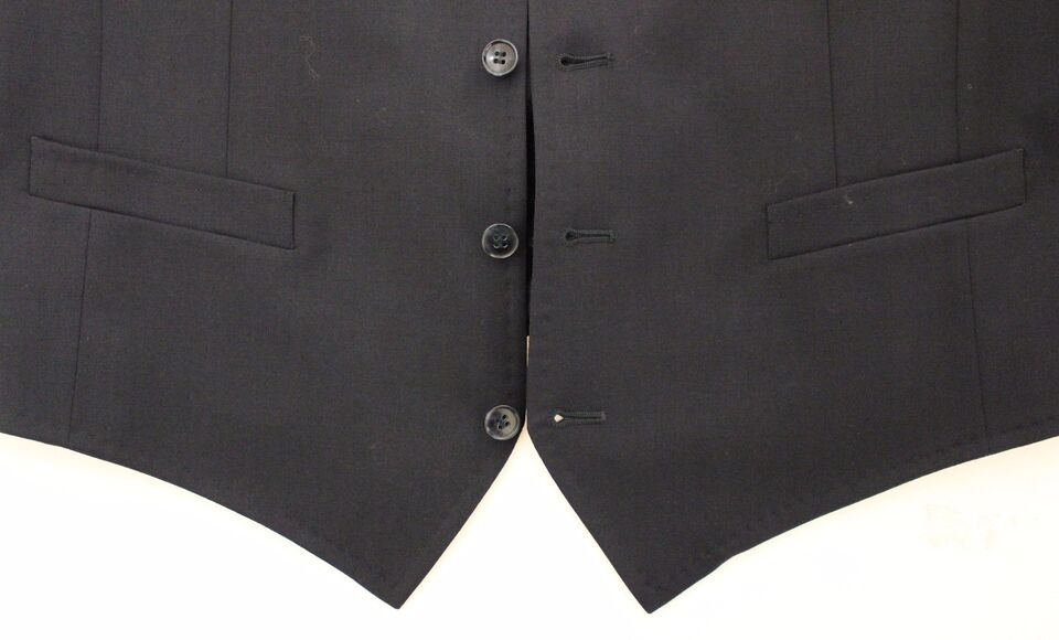 Gray striped wool silk dress vest gilet by Dolce & Gabbana, showing tailored fit and textured fabric details.