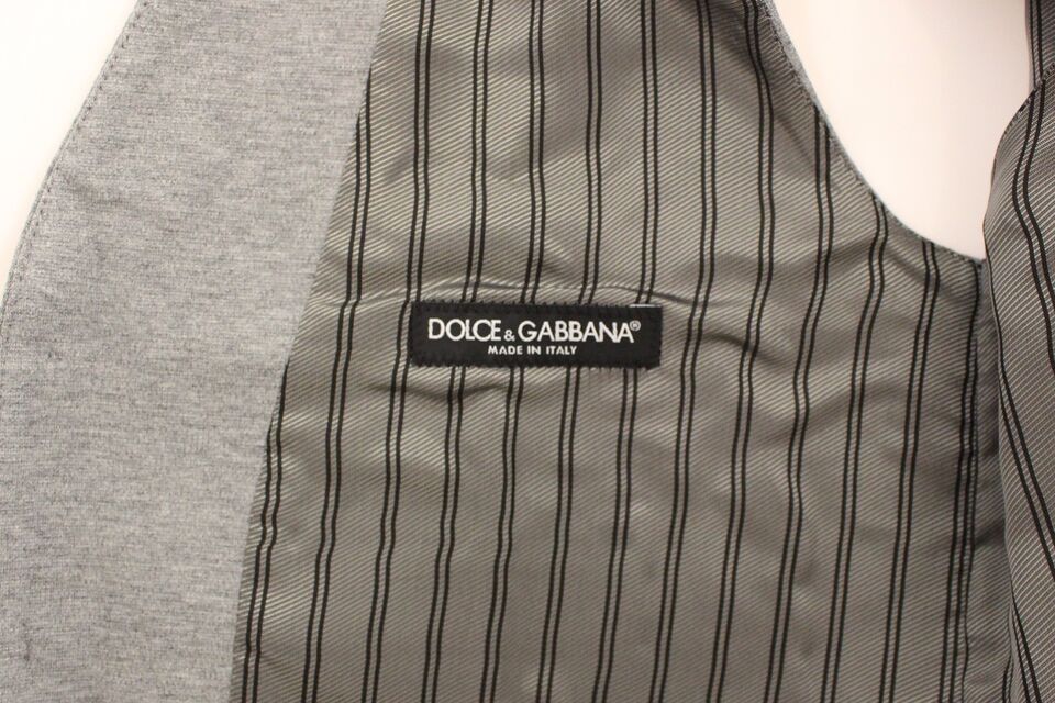 Gray cotton stretch dress vest blazer by Dolce & Gabbana, tailored fit with lapel collar and button closure.