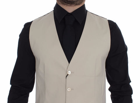 Beige cotton stretch dress vest blazer by Dolce & Gabbana, tailored fit with lapel collar and button closure.