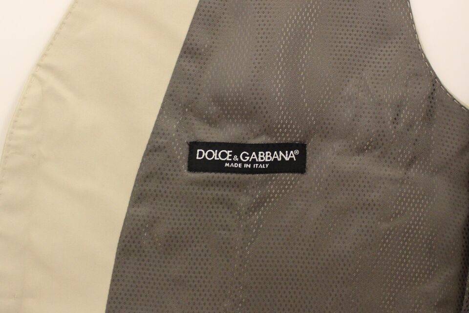 Beige cotton stretch dress vest blazer by Dolce & Gabbana, tailored fit with lapel collar and front button closure.