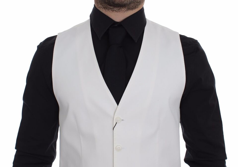 White cotton silk blend dress vest blazer by Dolce & Gabbana, tailored fit with lapels, front buttons, and sleek design.