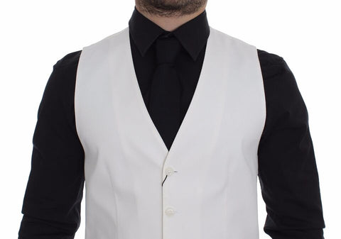 White cotton silk blend dress vest blazer by Dolce & Gabbana, tailored fit with lapels, front buttons, and sleek design.