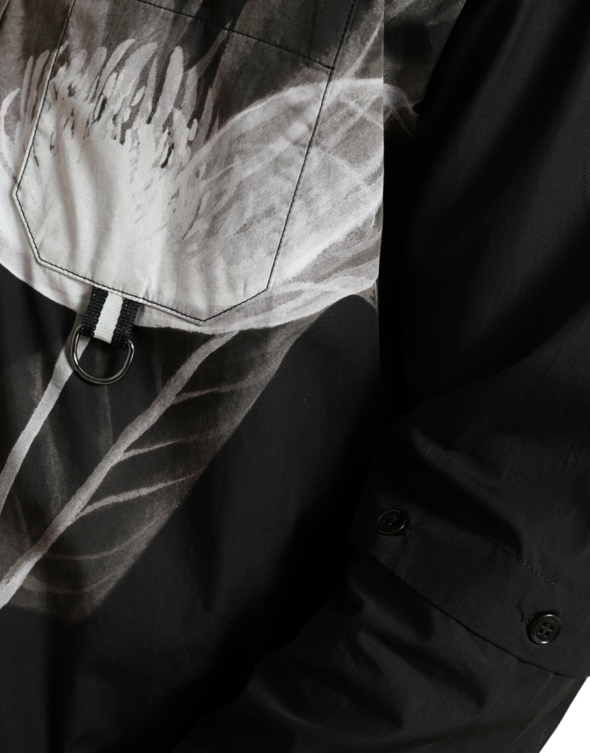 Black floral cotton long-sleeve men's shirt with a collar by Dolce & Gabbana, featuring a stylish floral pattern.