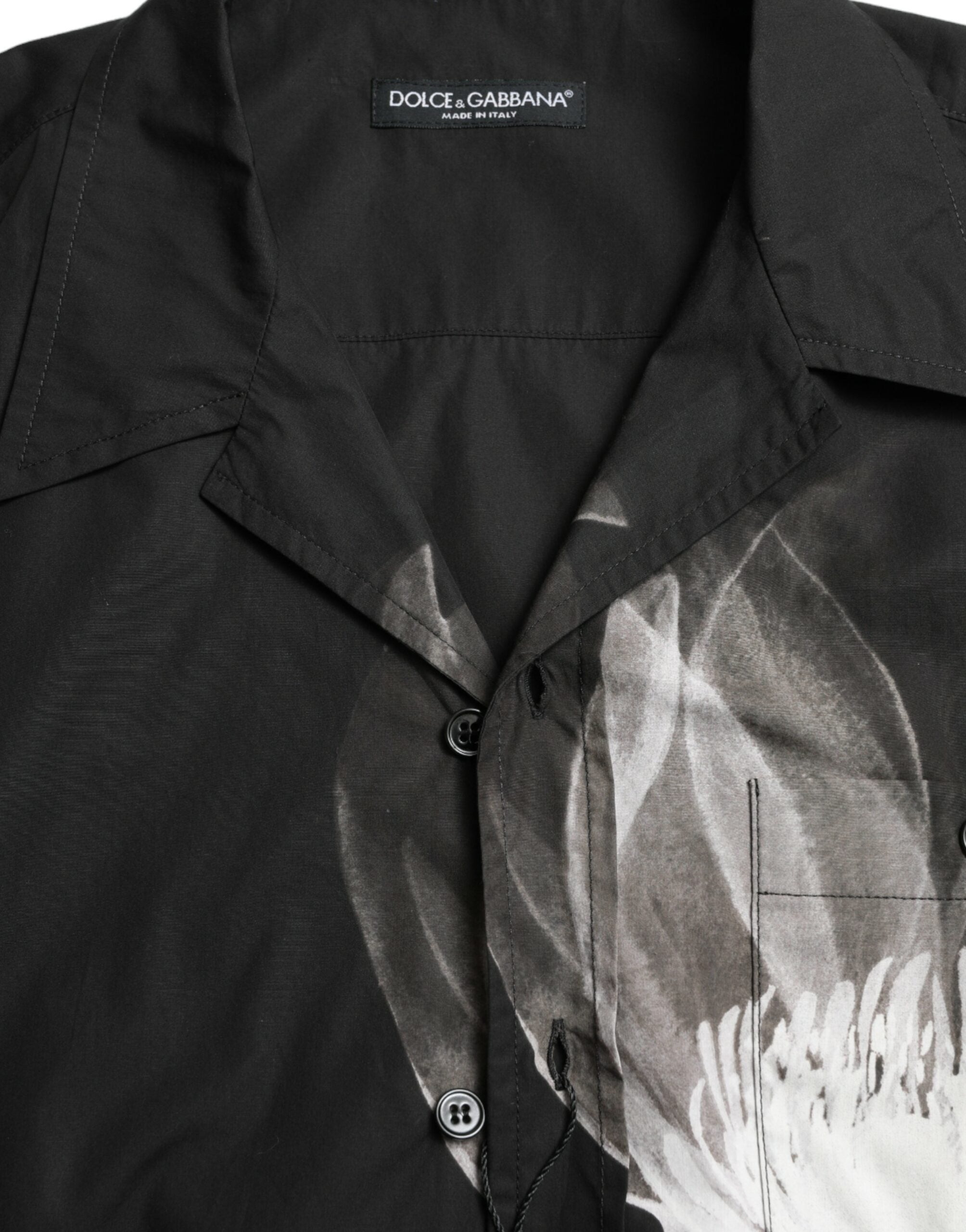 Black floral cotton men's shirt with a collar and long sleeves by Dolce & Gabbana, featuring a stylish floral pattern.