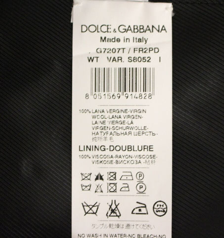 Gray striped wool single-breasted vest by Dolce & Gabbana, shown on a mannequin, featuring classic tailoring and elegant design.