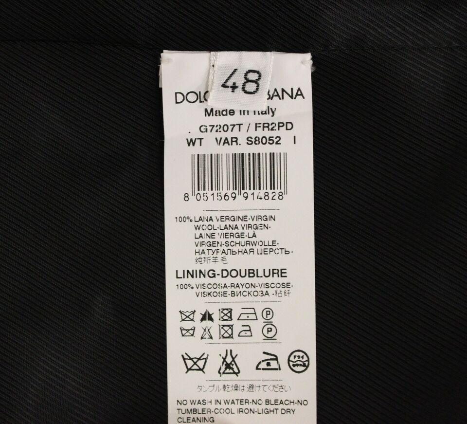 Gray striped wool single-breasted vest by Dolce & Gabbana with tailored fit and button closure, displayed on a neutral background.