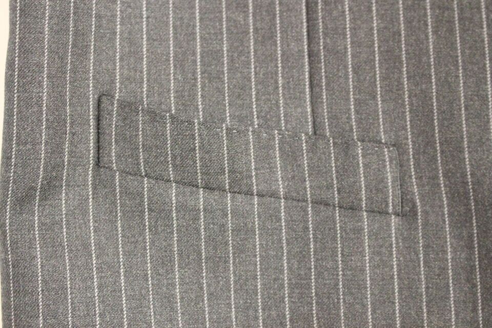 Gray striped wool single-breasted vest by Dolce & Gabbana, tailored fit with button closure and classic lapel.