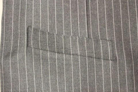 Gray striped wool single-breasted vest by Dolce & Gabbana, tailored fit with button closure and classic lapel.