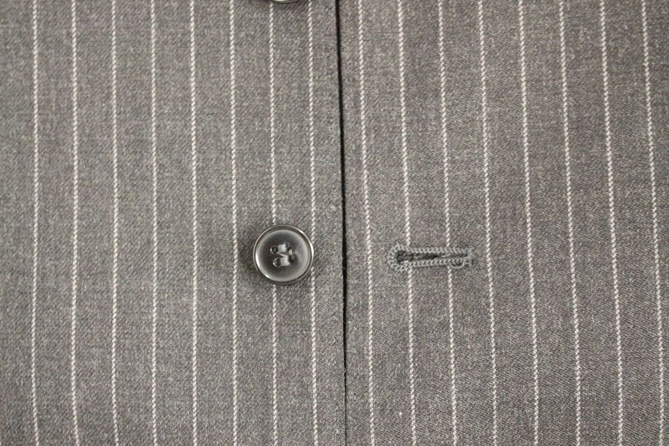 Gray striped wool single-breasted vest by Dolce & Gabbana, featuring a tailored fit and classic design.