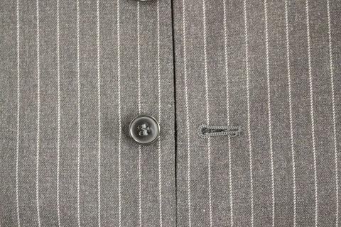 Gray striped wool single-breasted vest by Dolce & Gabbana, featuring a tailored fit and classic design.