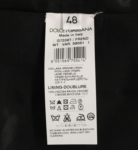 Black striped wool single-breasted vest by Dolce & Gabbana, featuring tailored fit and classic button closure.
