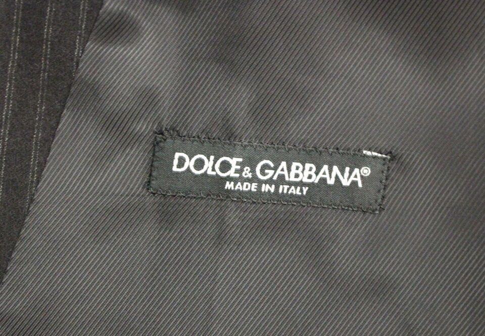 Black striped wool single-breasted vest by Dolce & Gabbana, showcasing tailored fit and classic design details.