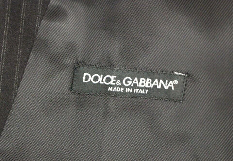 Black striped wool single-breasted vest by Dolce & Gabbana, showcasing tailored fit and classic design details.