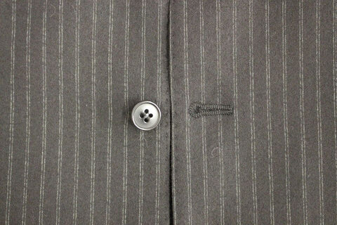 Black striped wool single-breasted vest by Dolce & Gabbana featuring tailored fit and classic lapel design.