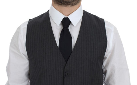 Black striped wool single-breasted vest by Dolce & Gabbana, tailored with a classic fit and button closure.