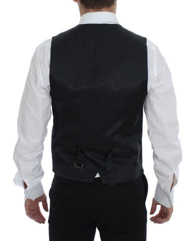 Black wool single-breasted vest with white stripes by Dolce & Gabbana, featuring a tailored fit and classic lapel design.