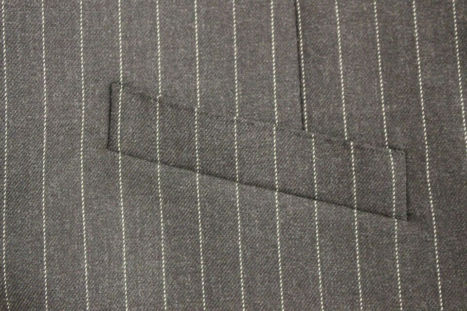 Gray striped wool Dolce & Gabbana logo vest, sleeveless gilet with a modern tailored fit, front logo embroidery, and ribbed trim.