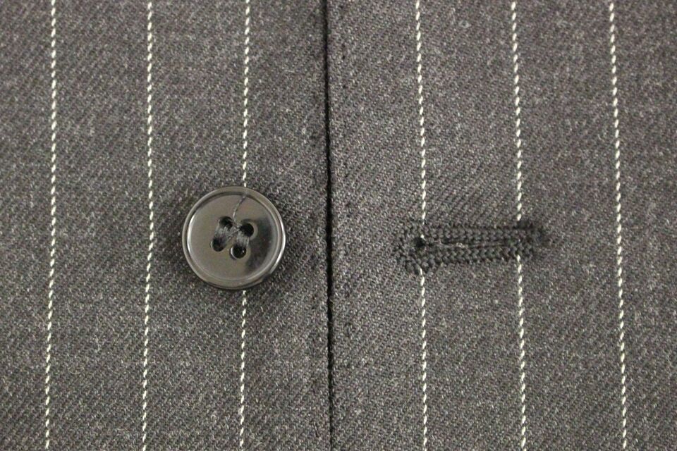 Gray wool vest with black stripe pattern and Dolce & Gabbana logo, sleeveless gilet style for a stylish layered look.