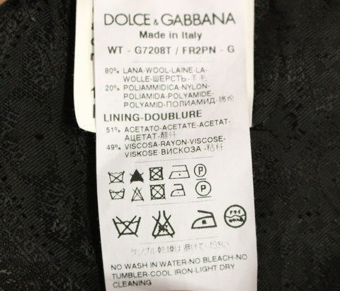 Black striped wool Dolce & Gabbana logo vest gilet with front pockets and button closure, stylish and cozy for casual wear.