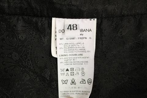 Black striped wool Dolce & Gabbana logo vest gilet with sleeveless design and front button closure.
