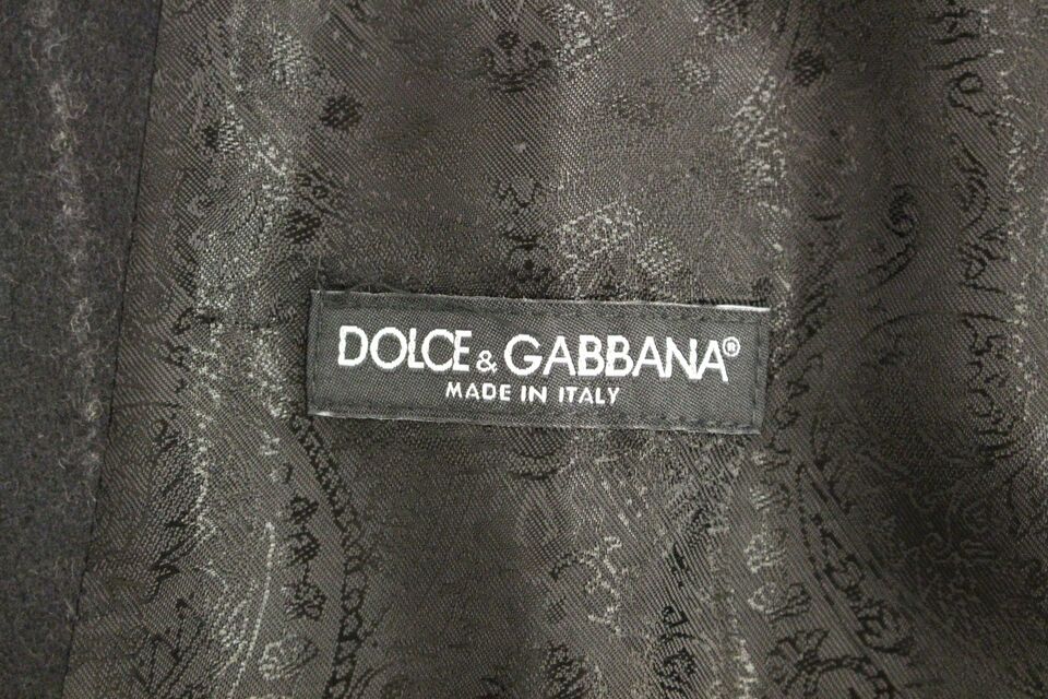 Black striped wool Dolce & Gabbana logo vest gilet, sleeveless wool waistcoat with bold stripe pattern, front logo detail.