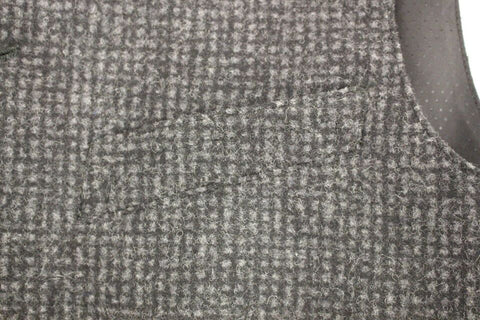Gray wool blend vest gilet by Dolce & Gabbana, featuring a tailored fit and textured fabric, displayed flat on a neutral background.