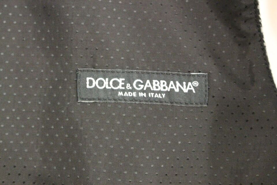 Gray cotton blend logo vest by Dolce & Gabbana, featuring a sleek design and subtle branding on the front.