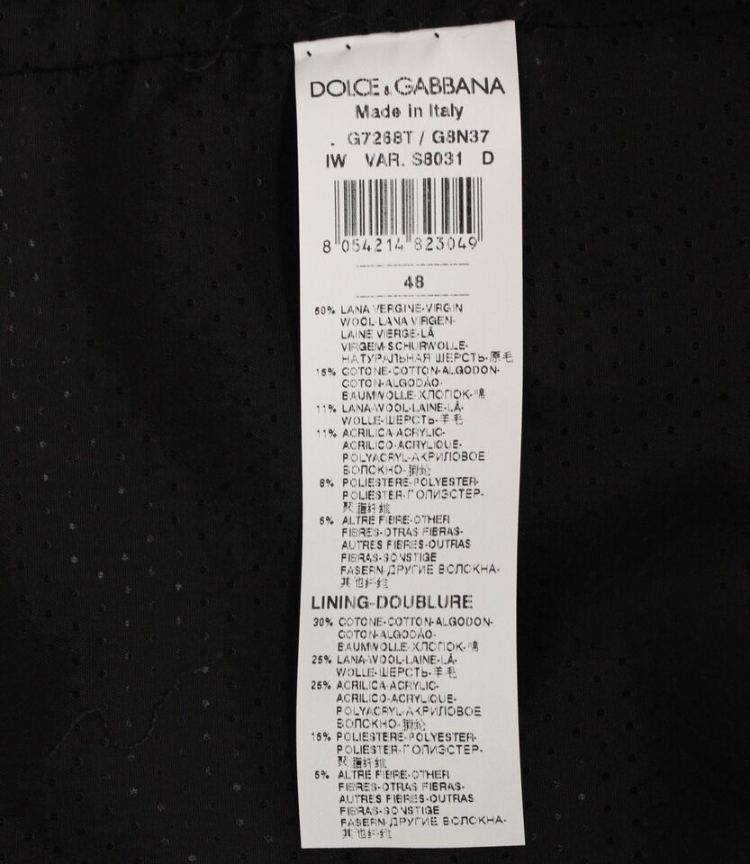 Gray wool blend logo vest by Dolce & Gabbana, showing the sleeveless gilet with brand logo detail and tailored fit.