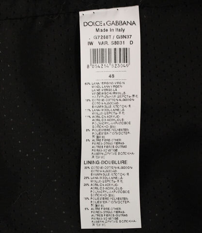 Gray wool blend logo vest by Dolce & Gabbana, showing the sleeveless gilet with brand logo detail and tailored fit.