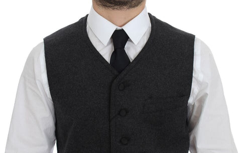 Gray wool blend Dolce & Gabbana logo vest with front zipper and sleeveless design, showcasing a stylish and cozy men's gilet.