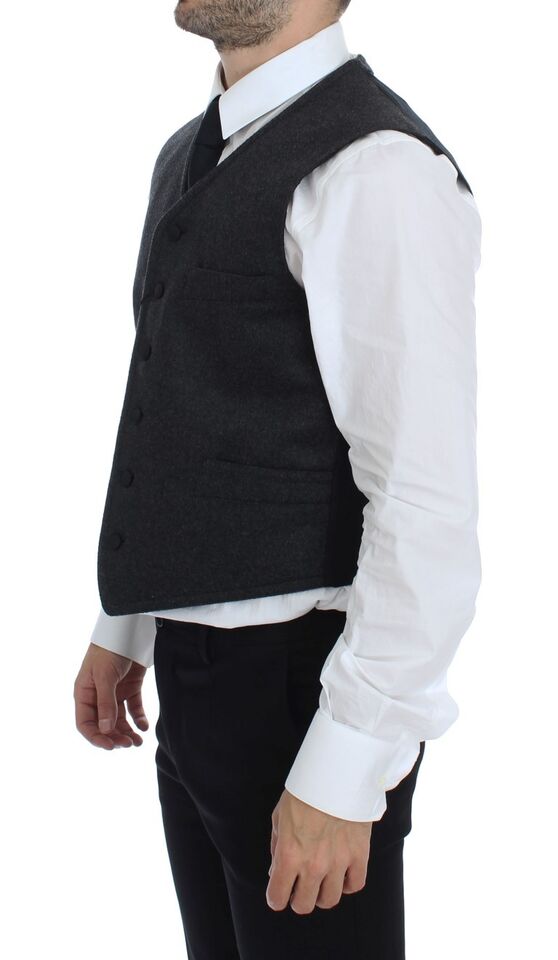 Gray wool blend Dolce & Gabbana logo vest featuring a sleek design and classic fit, shown on a plain background.