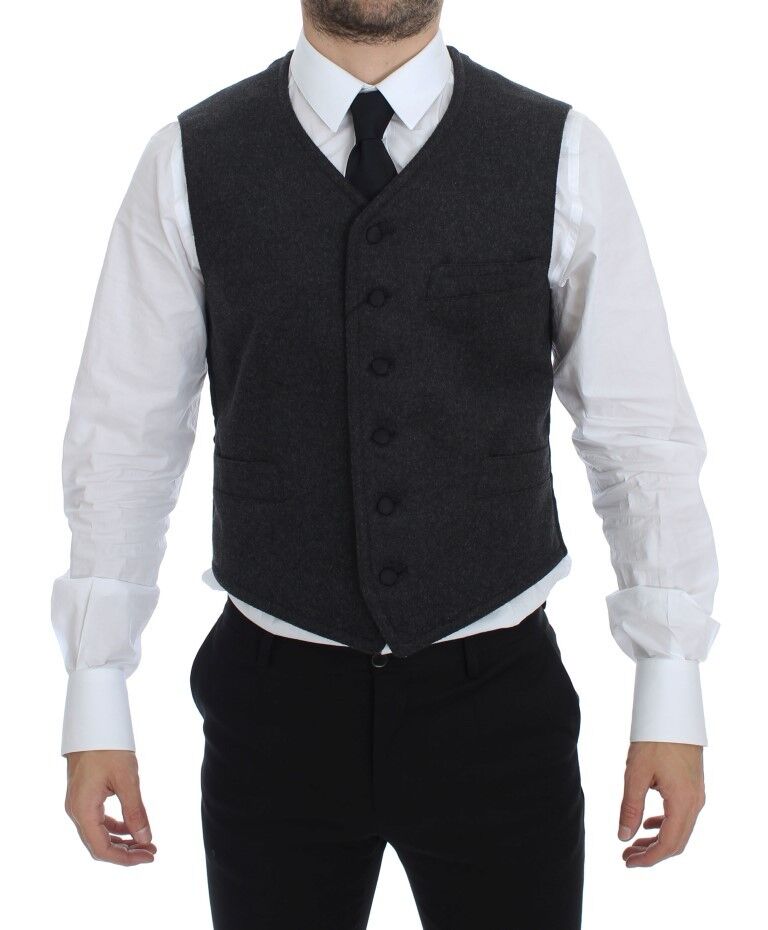 Gray wool blend logo vest by Dolce & Gabbana, stylish gilet with branded logo, front view showing the sleeveless design.