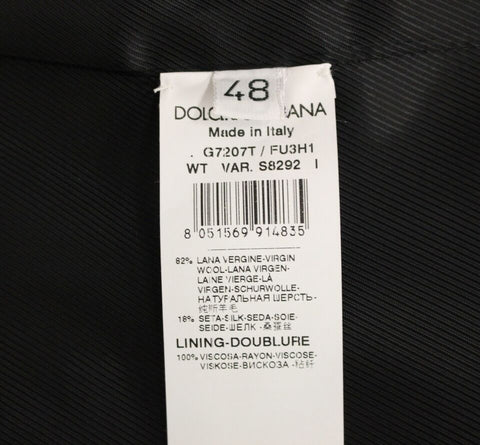 Gray wool silk dress vest by Dolce & Gabbana, stylish gilet with tailored fit, featuring smooth silk accents and classic design.