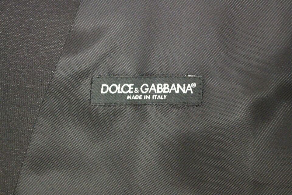 Gray wool silk dress vest by Dolce & Gabbana, tailored sleeveless gilet with refined fabric details and classic design.