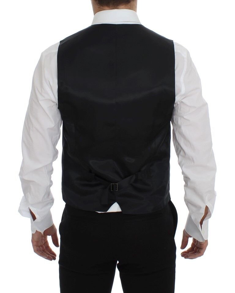 Gray wool and silk dress vest by Dolce & Gabbana, featuring tailored fit and elegant design, displayed on a neutral background.