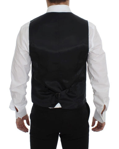 Gray wool and silk dress vest by Dolce & Gabbana, featuring tailored fit and elegant design, displayed on a neutral background.