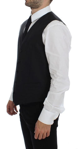 Gray wool silk dress vest by Dolce & Gabbana, stylish gilet with tailored fit and smooth fabric details.